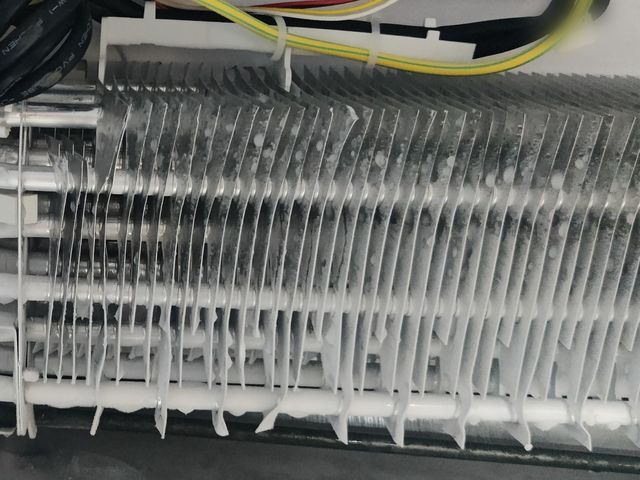 Frost built up on a refrigerator evaporator coil